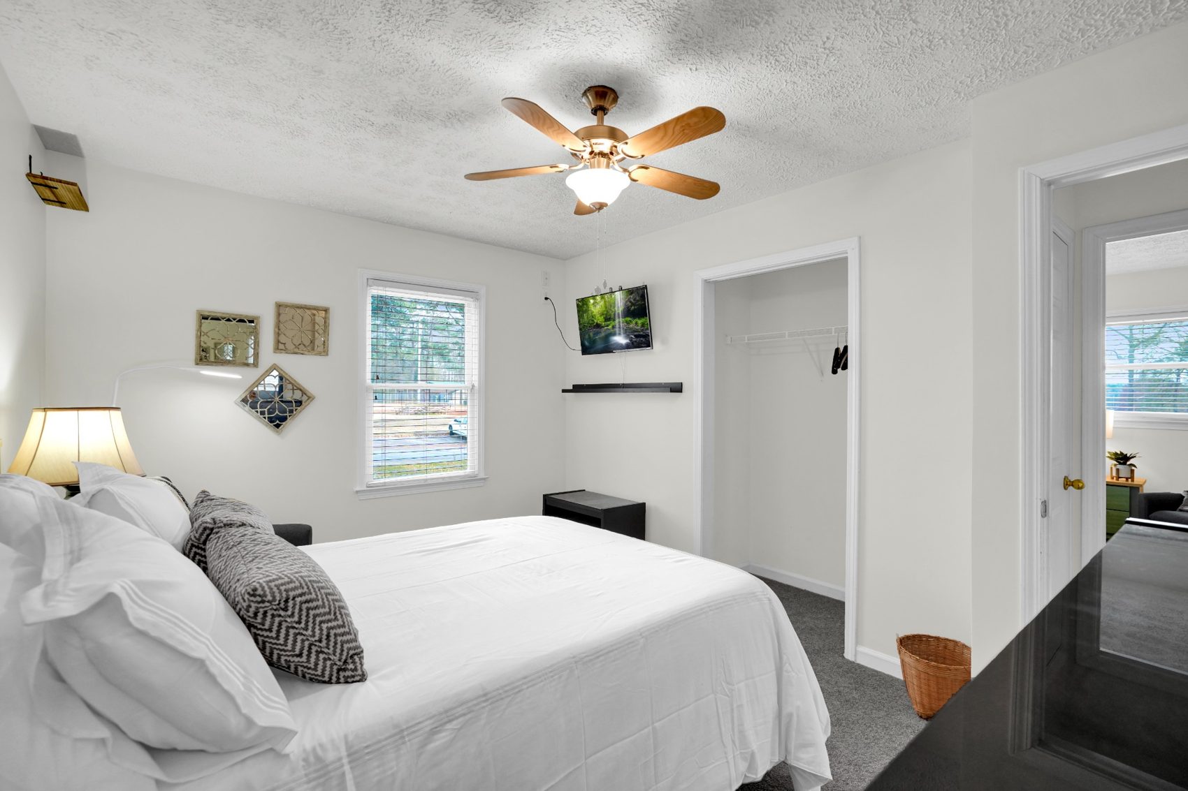 Inviting queen guest bedroom with green furniture