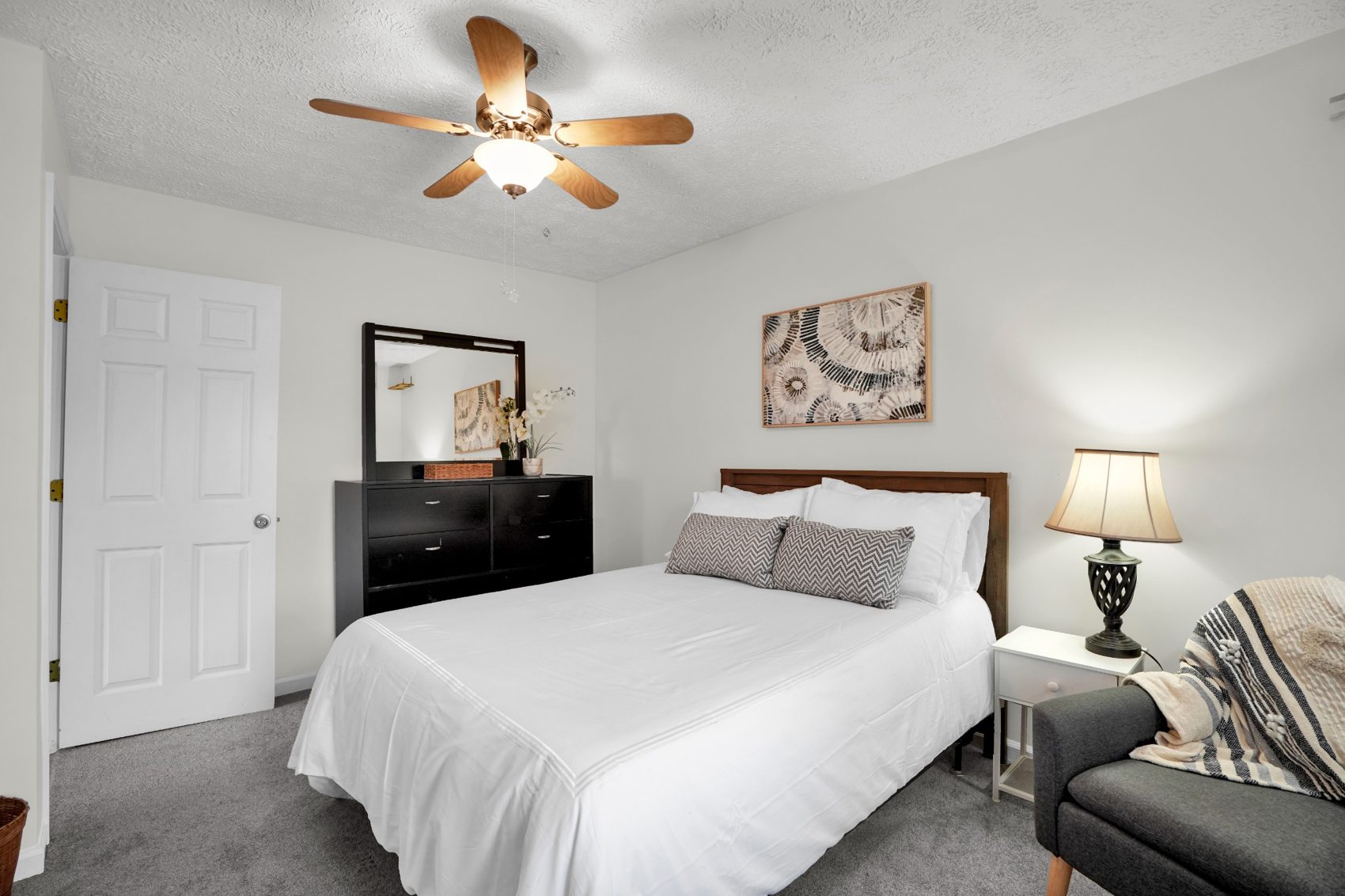 Another guest bedroom with white bedding